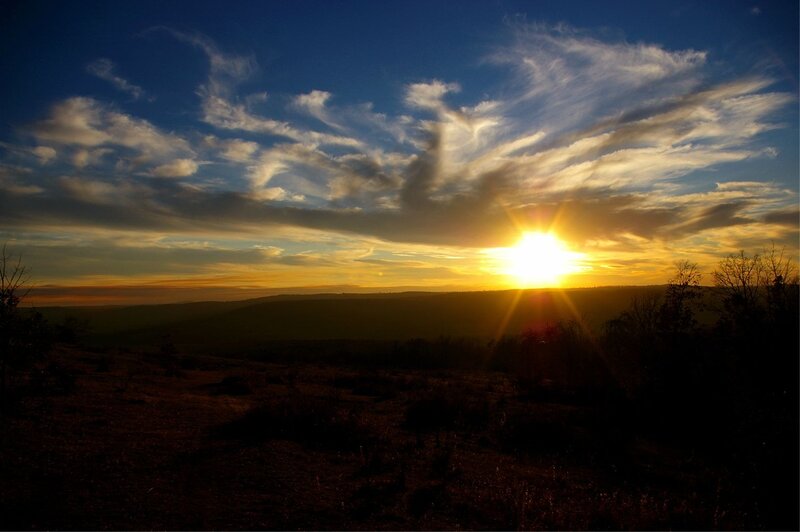 Sun Setting over Hills — Blue, Dramatic
