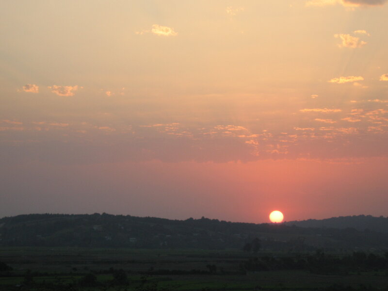 Sun Setting over Hills — Orange, Serene, Sunset, Photograph, Clouds, Pink
