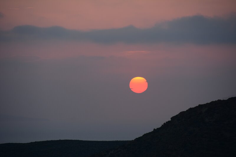 Sun Setting over Hills — Orange, Serene, Sunset, Photograph, Sky, Clouds