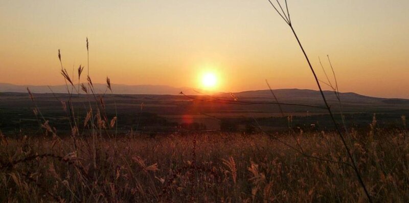 Sun Setting over Hills — Orange, Serene