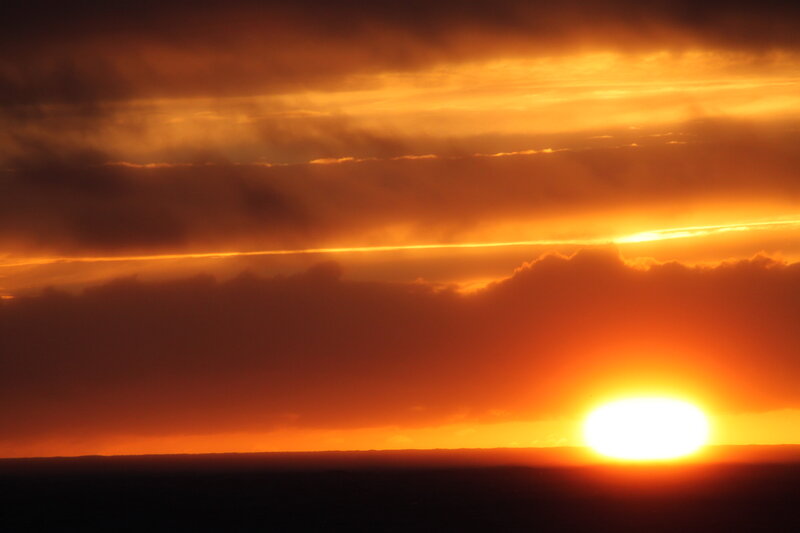 Sun Setting over Horizon — Orange, Dramatic, Sunset
