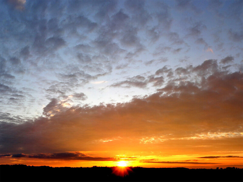 Sun Setting over Horizon — Orange, Dramatic