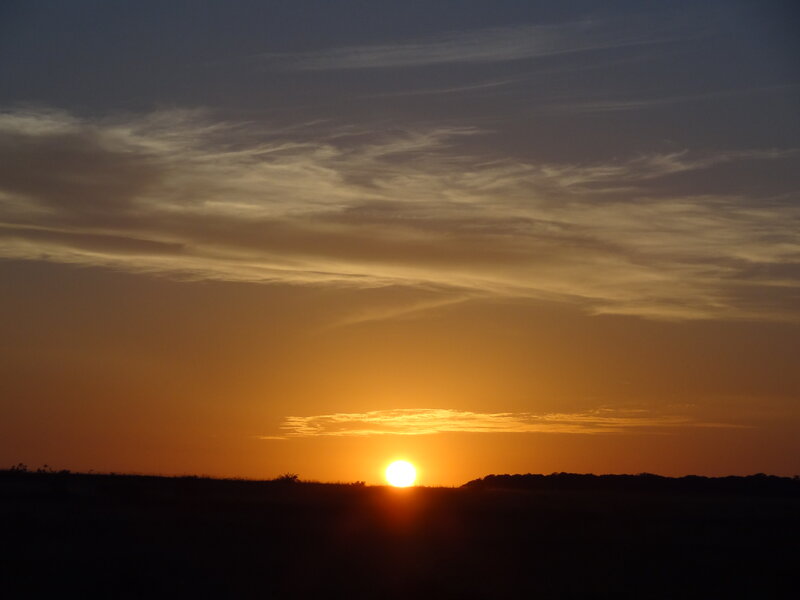 Sun Setting over Horizon — Orange, Serene