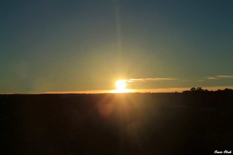Sun Setting over Horizon — Yellow, Serene, Sunset