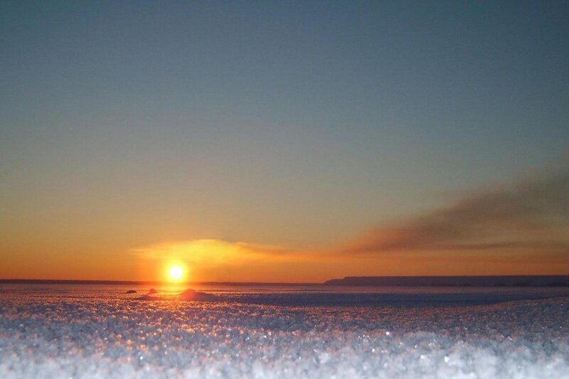 Sun Setting over Ice — Orange