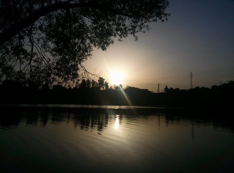 Sun Setting over Lake — Black