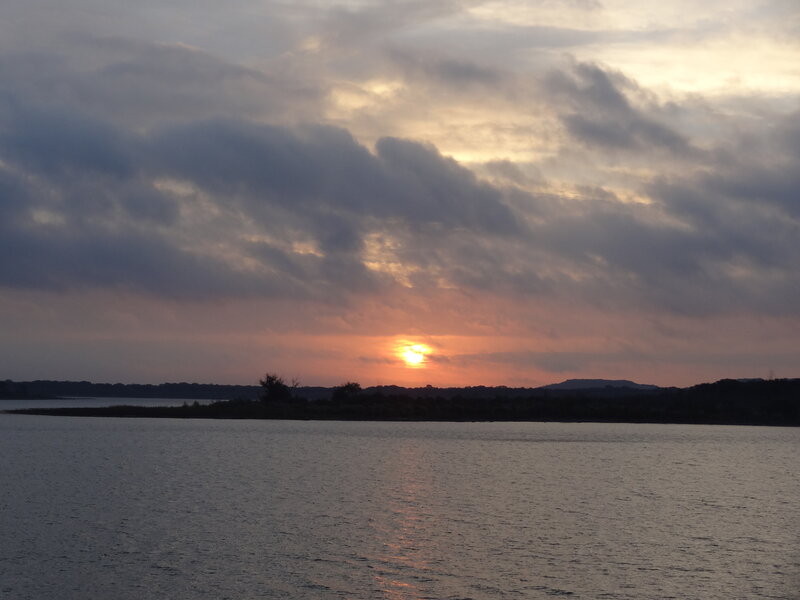Sun Setting over Lake — Orange, Serene, Sunset, Photograph, Clouds, Trees