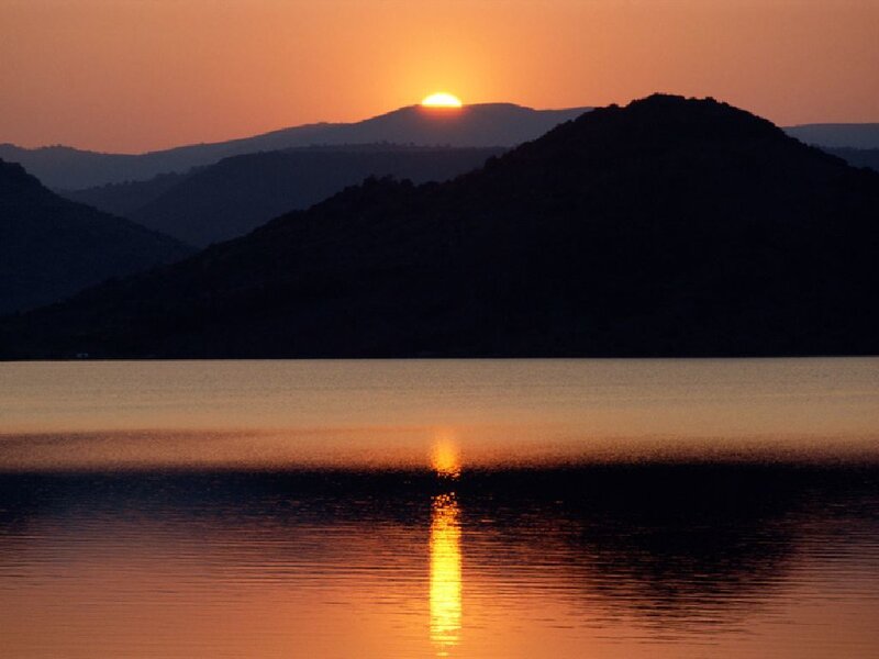 Sun Setting over Lake — Orange, Serene, Sunset, Photograph, Mountains, Sky, Black