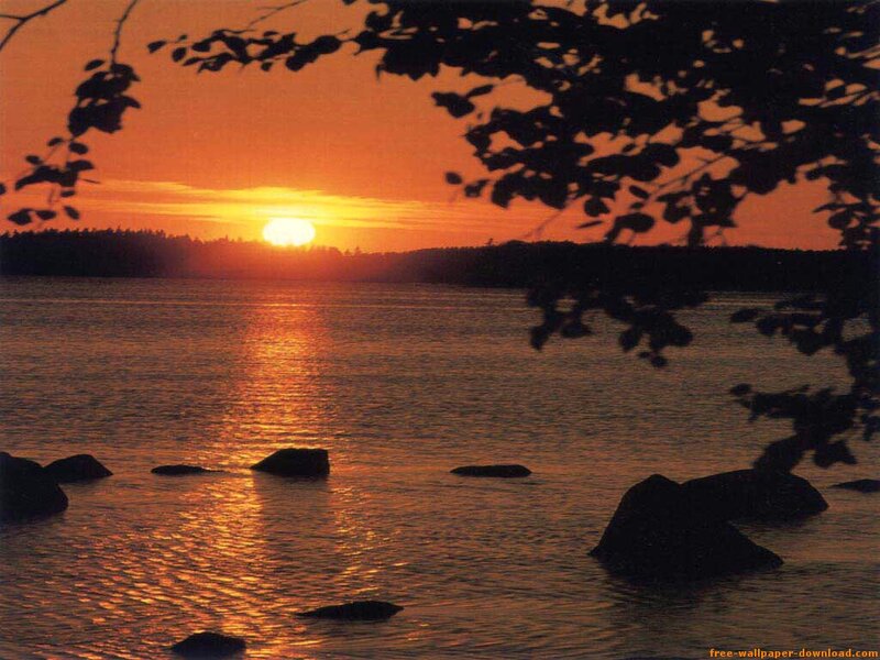 Sun Setting over Lake — Orange, Serene, Sunset, Photograph, Trees, Rocks