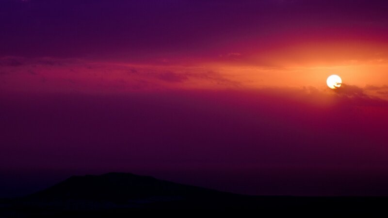Sun Setting over Mountain