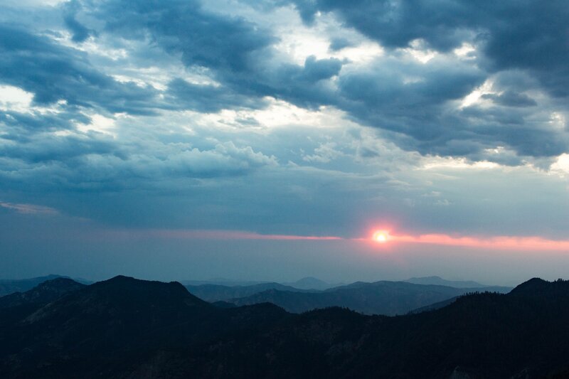 Sun Setting over Mountains — Blue