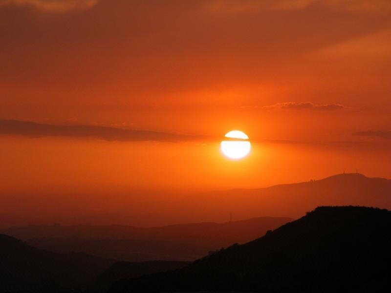 Sun Setting over Mountains — Orange, Dramatic, Sunset, Photograph, Sky, Clouds
