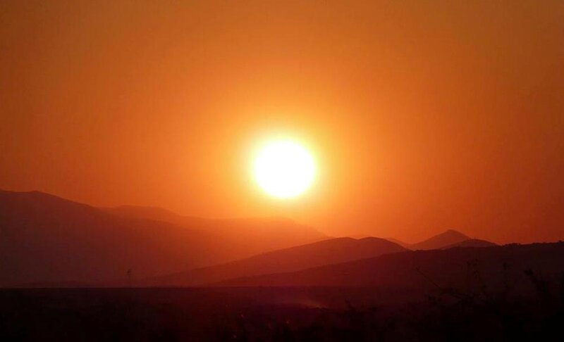 Sun Setting over Mountains — Orange, Dramatic
