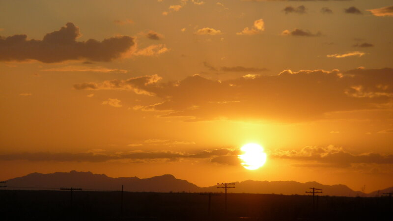 Sun Setting over Mountains — Orange, Serene, Sunset, Photograph, Clouds, Power Lines