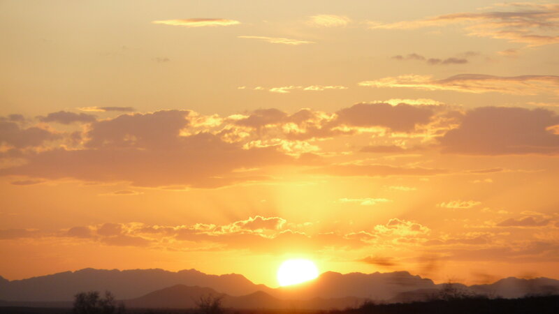 Sun Setting over Mountains — Orange, Serene, Sunset, Photograph, Clouds, Trees