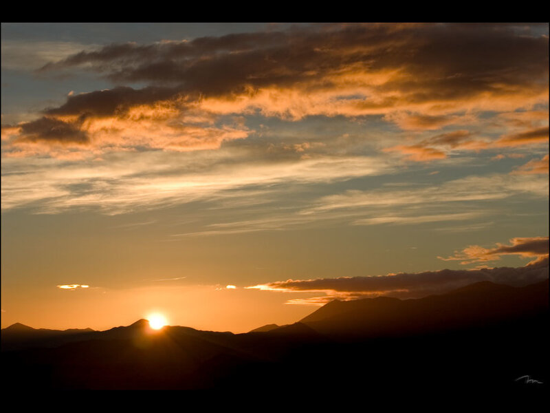 Sun Setting over Mountains — Orange, Serene, Sunset, Photograph, Clouds, Yellow