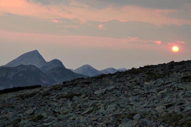 Sun Setting over Mountains — Orange, Serene, Sunset, Photograph, Sky, Rocks