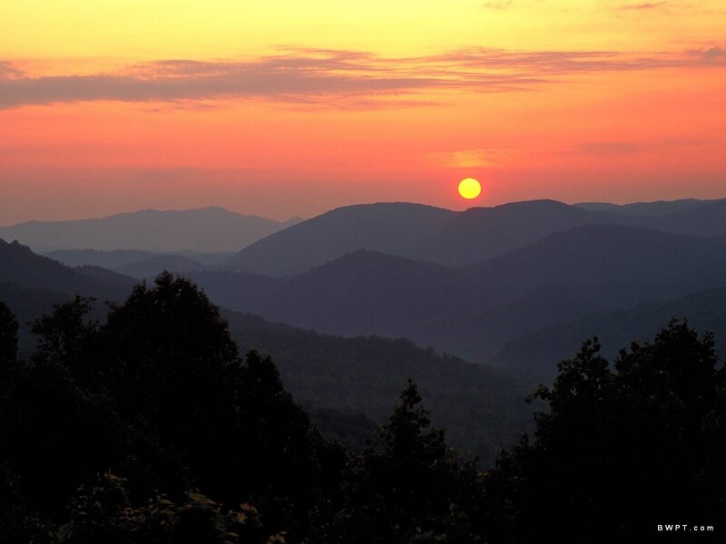 Sun Setting over Mountains — Trees