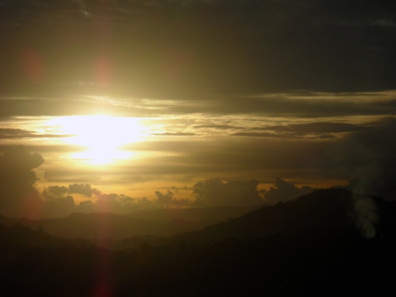 Sun Setting over Mountains — Yellow, Dramatic