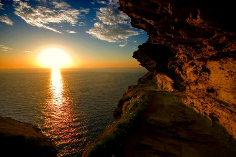 Sun Setting over Ocean — Blue, Dramatic, Sunset, Photograph, Cliff