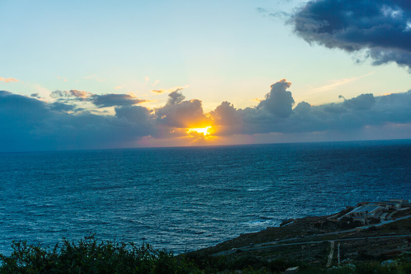 Sun Setting over Ocean — Blue, Dramatic, Sunset, Photograph, Clouds, Coastline