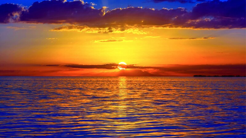 Sun Setting over Ocean — Blue, Dramatic, Sunset, Photograph, Clouds, Reflection