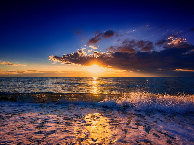 Sun Setting over Ocean — Blue, Dramatic, Sunset, Photograph, Clouds, Waves, Foam