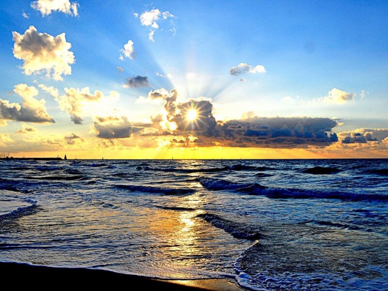 Sun Setting over Ocean — Blue, Dramatic, Sunset, Photograph, Clouds, Waves, Sailboats