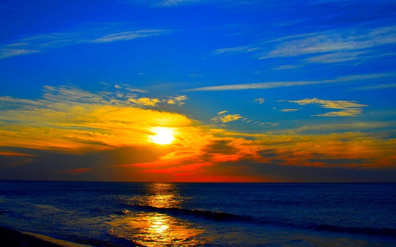 Sun Setting over Ocean — Blue, Dramatic, Sunset, Photograph, Sky