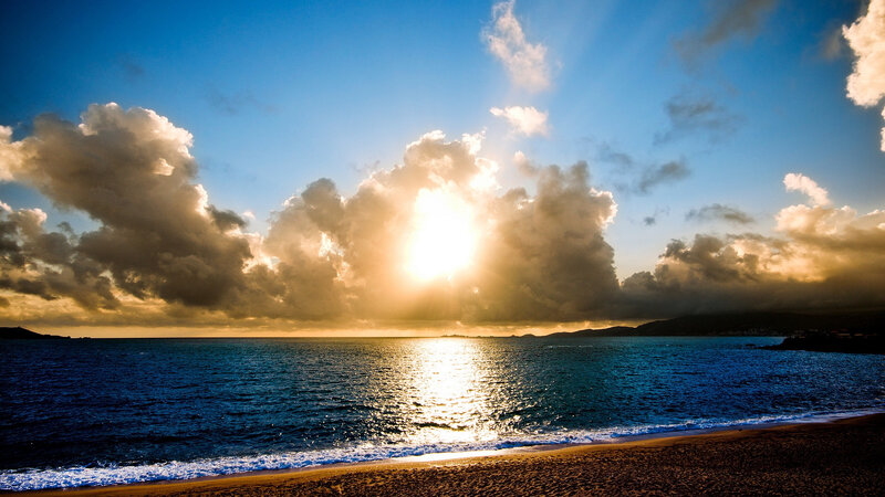 Sun Setting over Ocean — Blue, Dramatic, Sunset