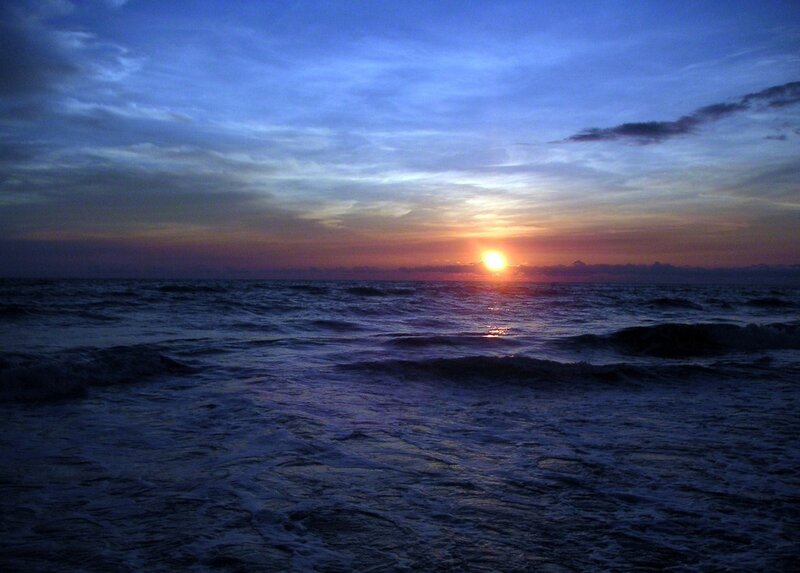 Sun Setting over Ocean — Blue, Purple