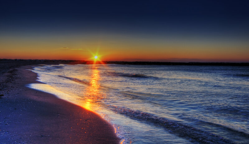 Sun Setting over Ocean — Blue, Serene, Sunset, Photograph, Beach, Waves