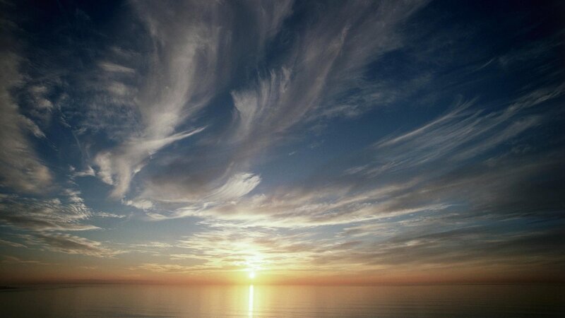 Sun Setting over Ocean — Blue, Serene, Sunset, Photograph, Clouds, Yellow, Orange
