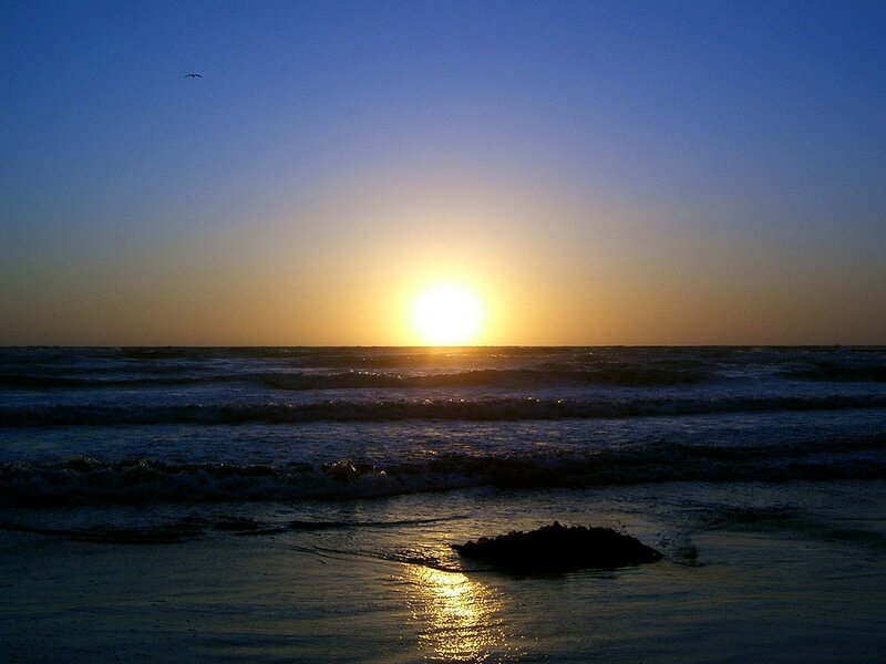 Sun Setting over Ocean — Blue, Serene, Sunset, Photograph, Waves