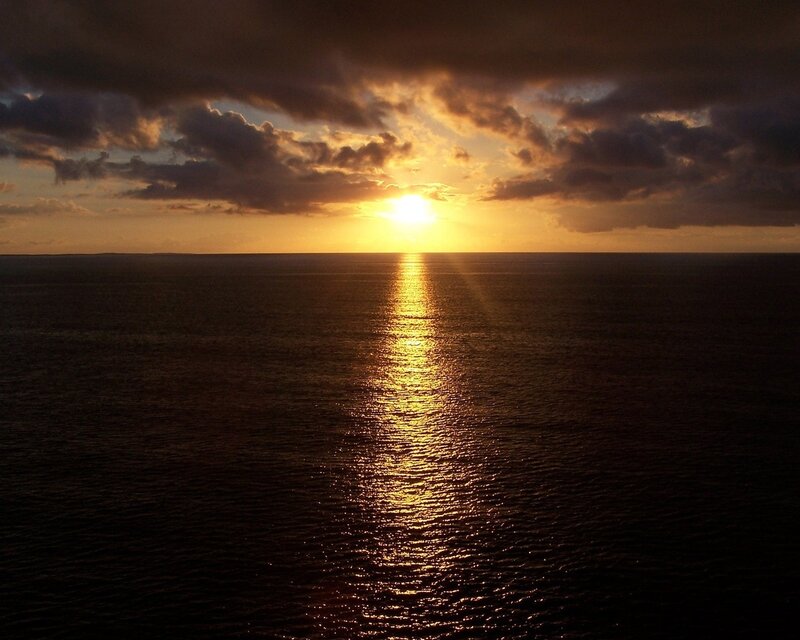 Sun Setting over Ocean — Gold, Dramatic, Sunset, Photograph, Clouds, Reflection
