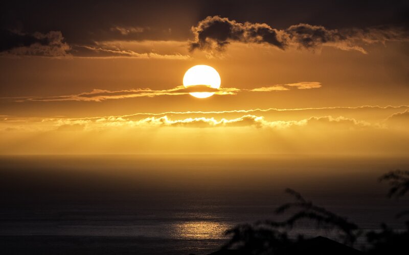 Sun Setting over Ocean — Gold, Dramatic, Sunset, Photograph, Clouds, Silhouette