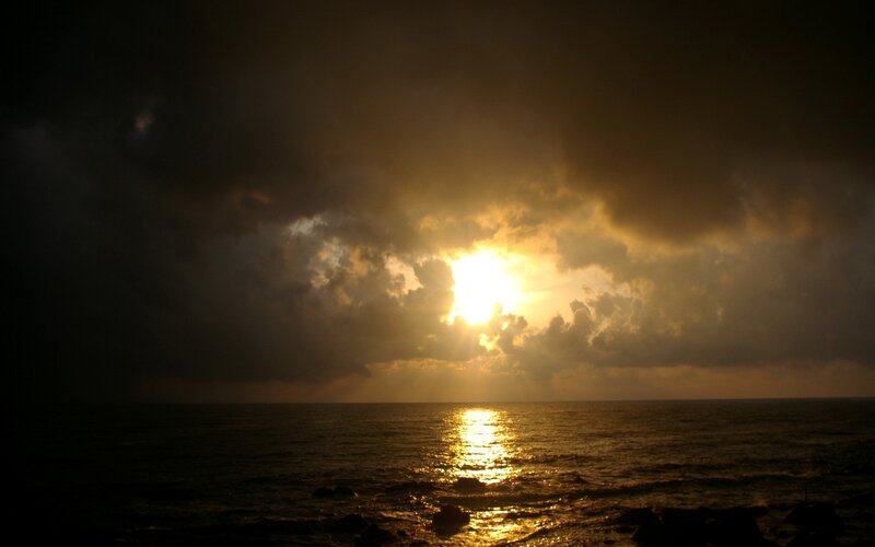 Sun Setting over Ocean — Gold, Dramatic, Sunset, Photograph, Clouds
