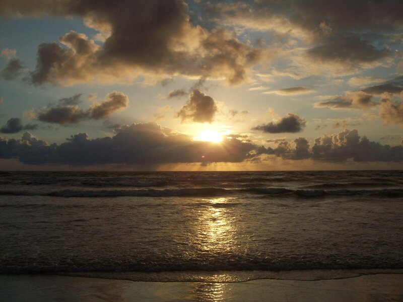 Sun Setting over Ocean — Gold, Dramatic, Sunset, Photograph, Clouds, Waves, Beach
