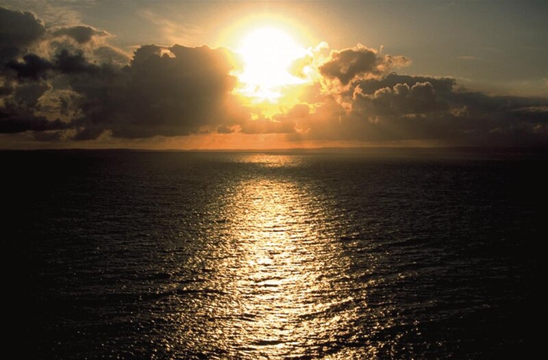 Sun Setting over Ocean — Gold, Dramatic, Sunset, Photograph