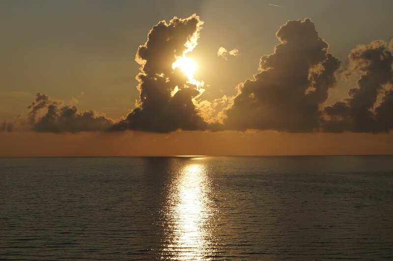 Sun Setting over Ocean — Gold, Serene, Sunset, Photograph, Clouds, Reflection