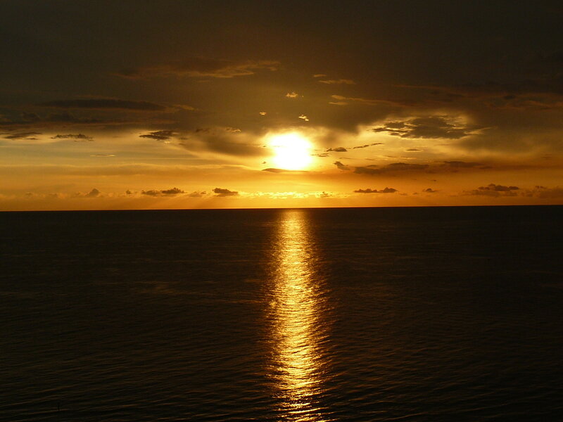 Sun Setting over Ocean — Gold, Serene, Sunset, Photograph, Clouds