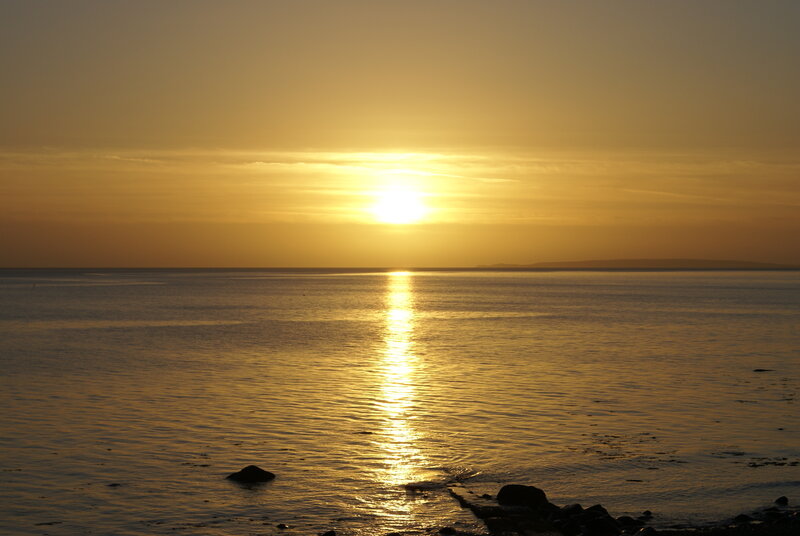 Sun Setting over Ocean — Gold