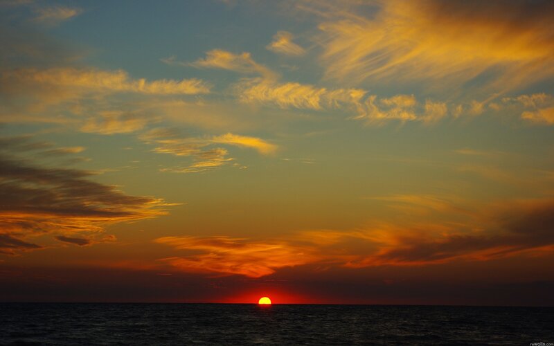 Sun Setting over Ocean — Orange, Blue