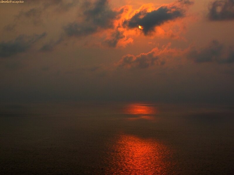 Sun Setting over Ocean — Orange, Dramatic, Sunset, Photograph, Clouds, Reflection, Dark Gray