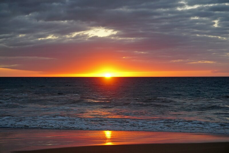 Sun Setting over Ocean — Orange, Dramatic, Sunset, Photograph, Clouds, Sand
