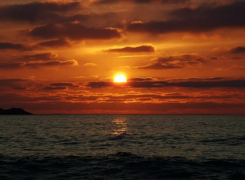 Sun Setting over Ocean — Orange, Dramatic, Sunset, Photograph, Clouds, Sea, Island