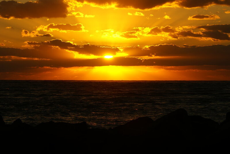 Sun Setting over Ocean — Orange, Dramatic, Sunset, Photograph, Clouds, Sea, Rocks