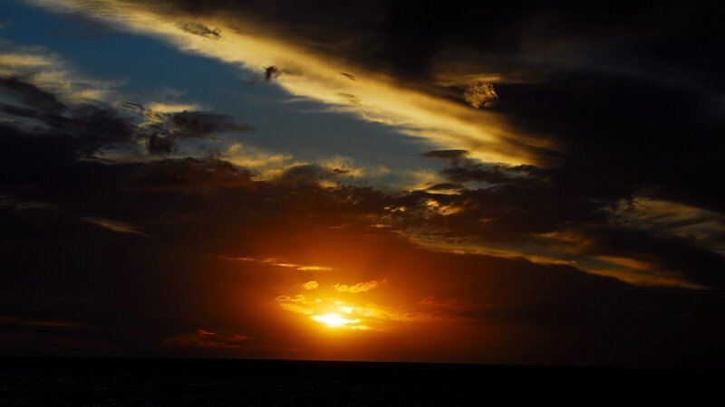 Sun Setting over Ocean — Orange, Dramatic, Sunset, Photograph, Clouds, Sky, Black, Blue
