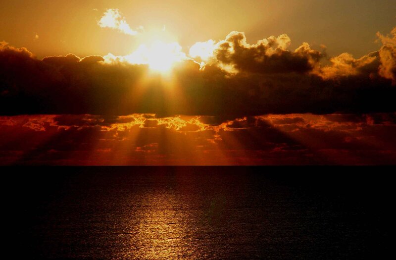 Sun Setting over Ocean — Orange, Dramatic, Sunset, Photograph, Clouds, Sunlight, Yellow