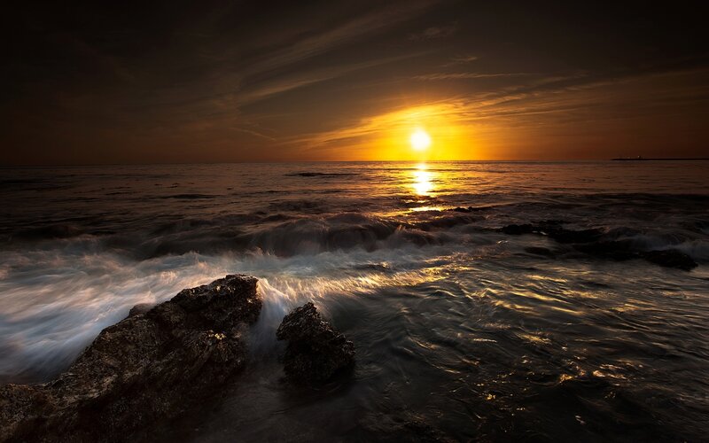Sun Setting over Ocean — Orange, Dramatic, Sunset, Photograph, Rocks, Waves